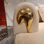 Fluid Curved Luxury Sofa Set with Sculptural Gold Stainless Steel Accents & Hammered Texture Base